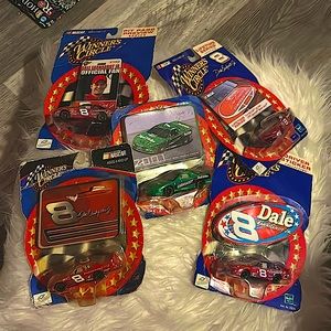 These are winners circle nascar. 4 Dale Jr. and a True Value #1 Dale Earnhardt.